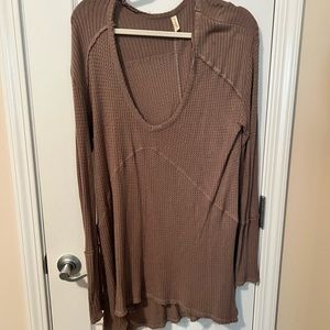 Free People brown longe sleeve top. Size medium.
